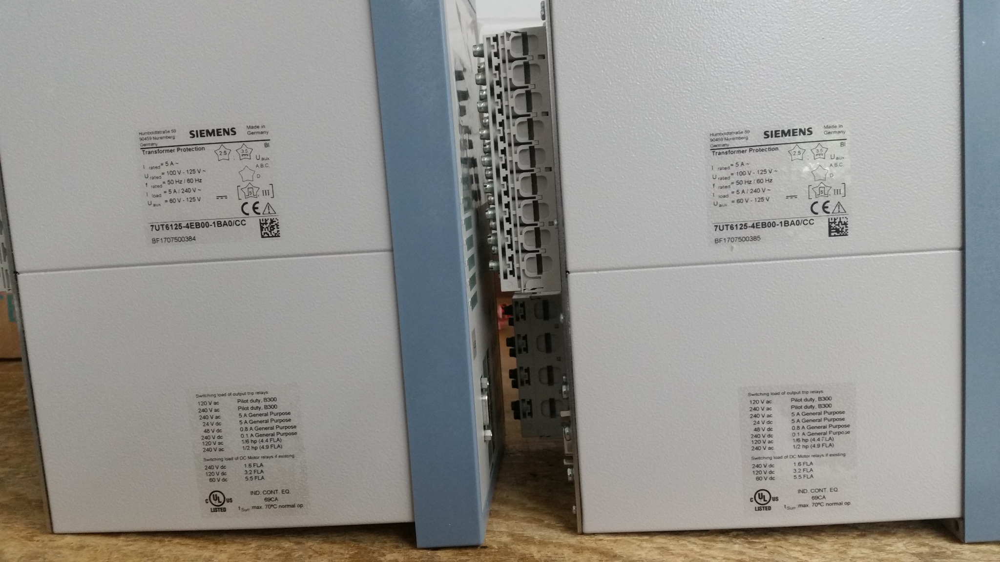 Side and rear view of Siemens transformer protection relays showing labels and connection terminals