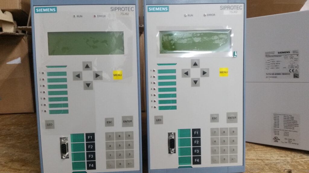 Front view of Siemens SIPROTEC protection relays with display panels and control keys for Potia Substation