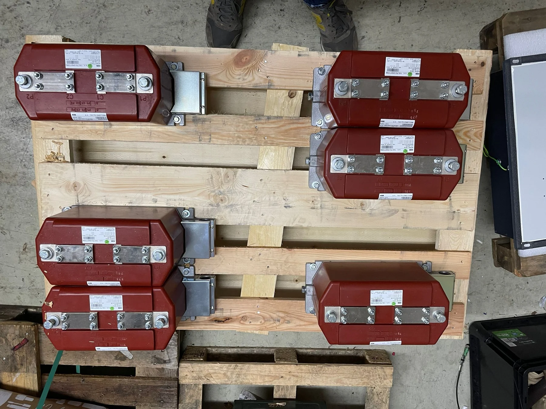 ABB KOFA 12F3 current transformers on pallet during inspection
