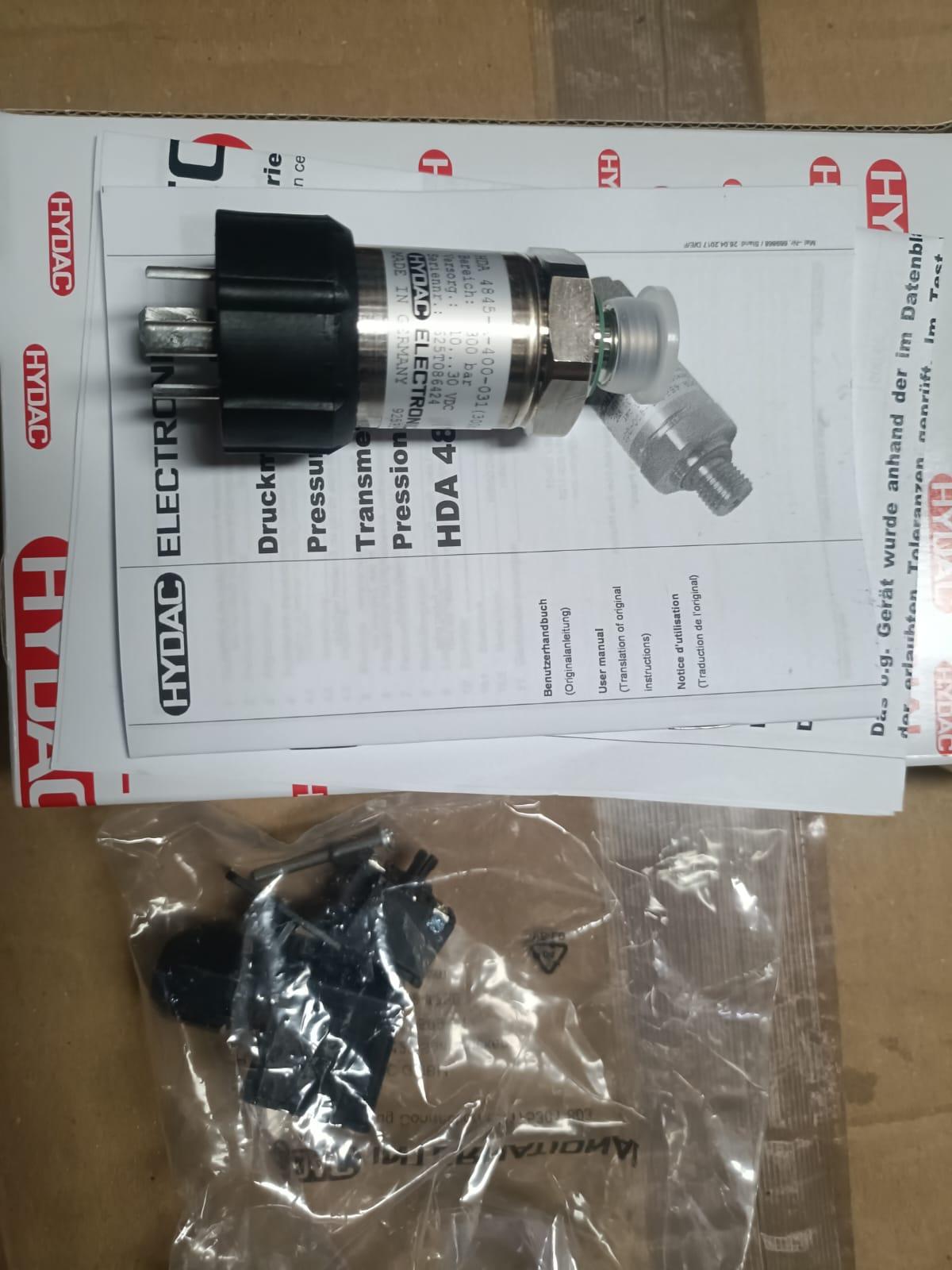 HYDAC pressure transducer with the manufacturer’s user manual and packaging