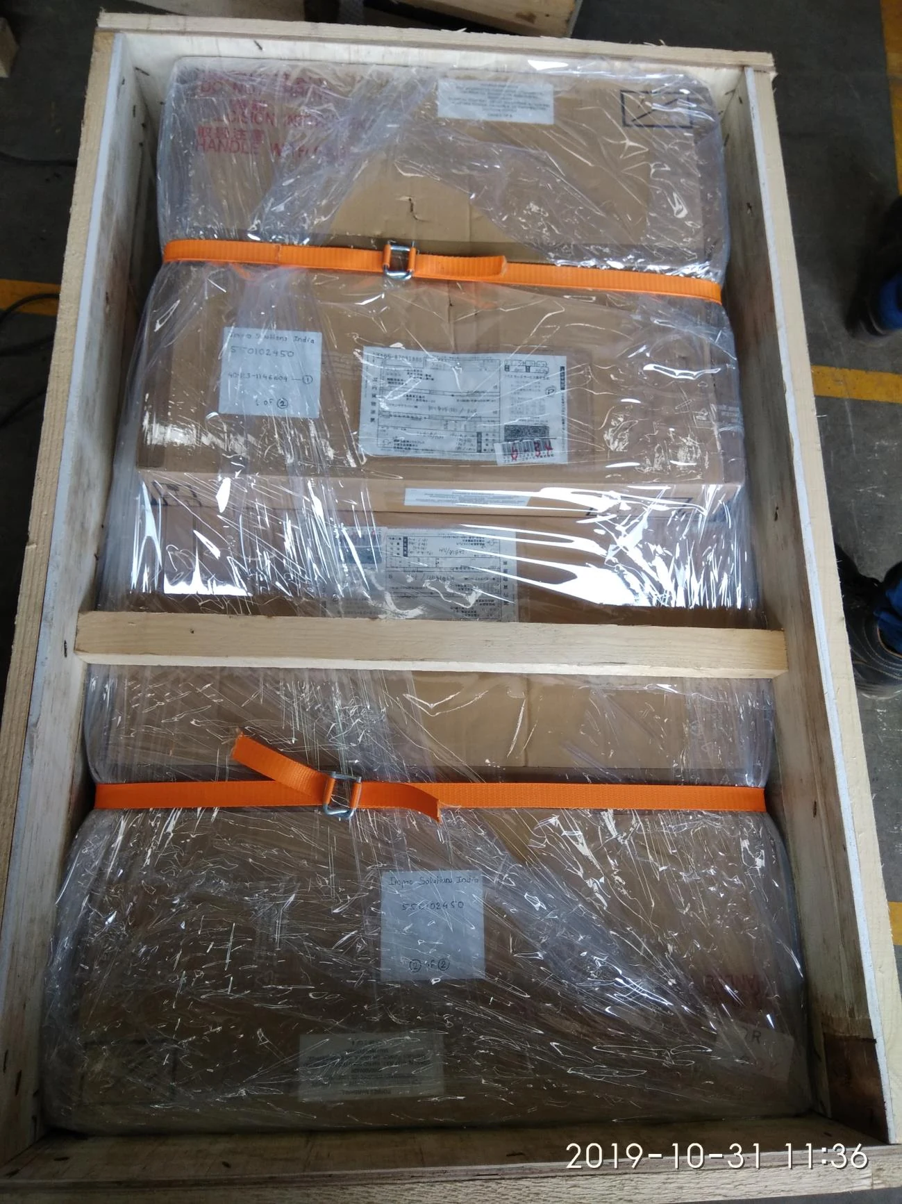 Shinkawa vibration monitoring system cartons secured inside export wooden crate